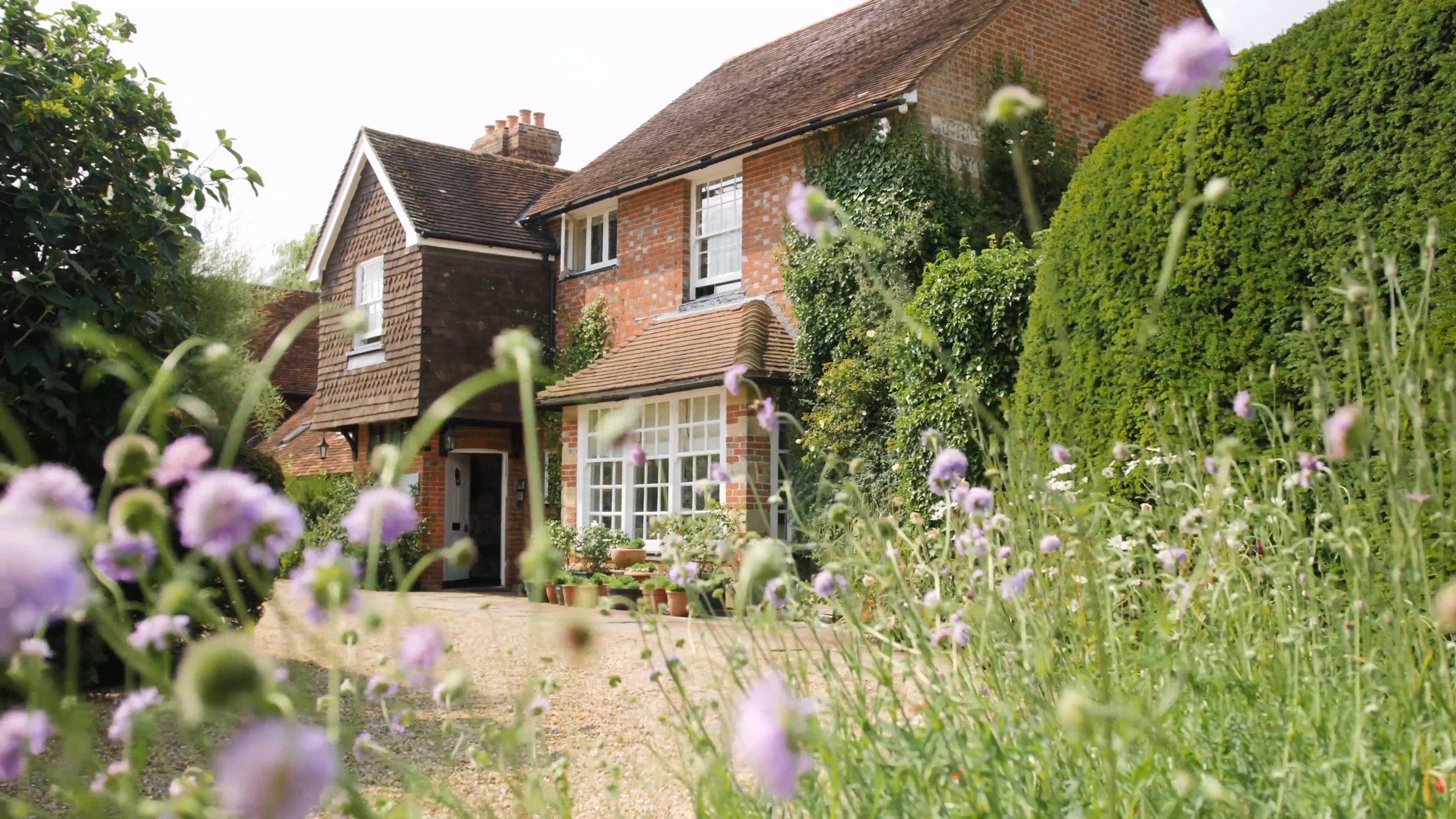 Balneath Manor seen across the garden