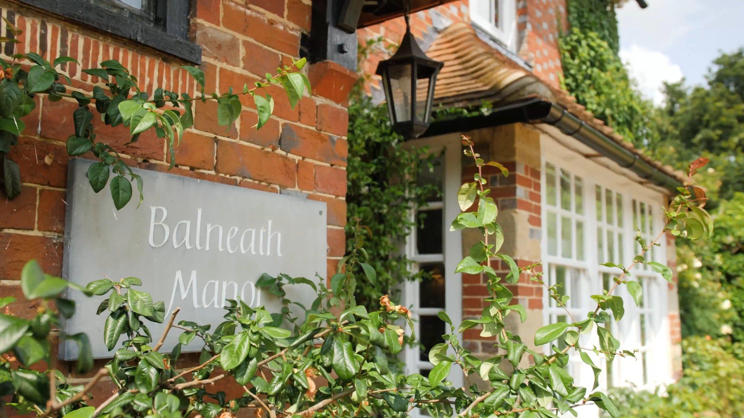 The Balneath Manor name plate by the front door