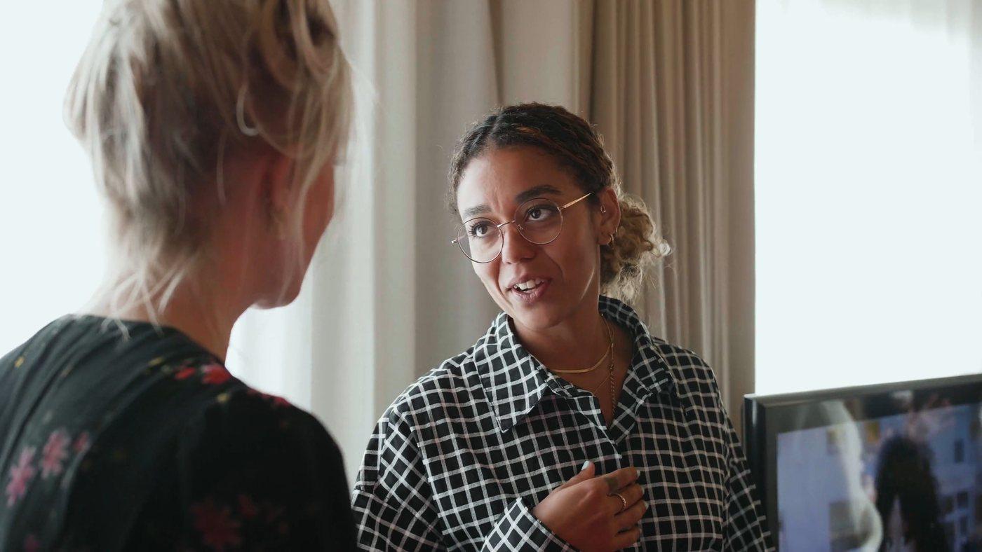 Two colleagues in conversation at head office