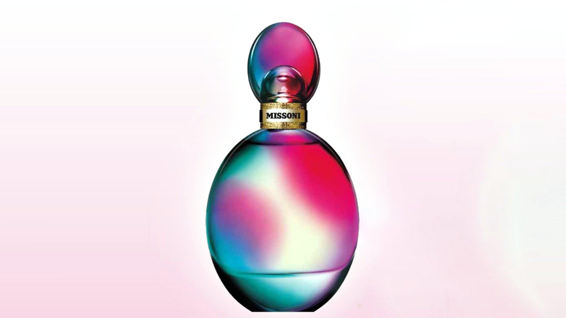 The Missoni bottle, its glass banded in pink, teal and blue